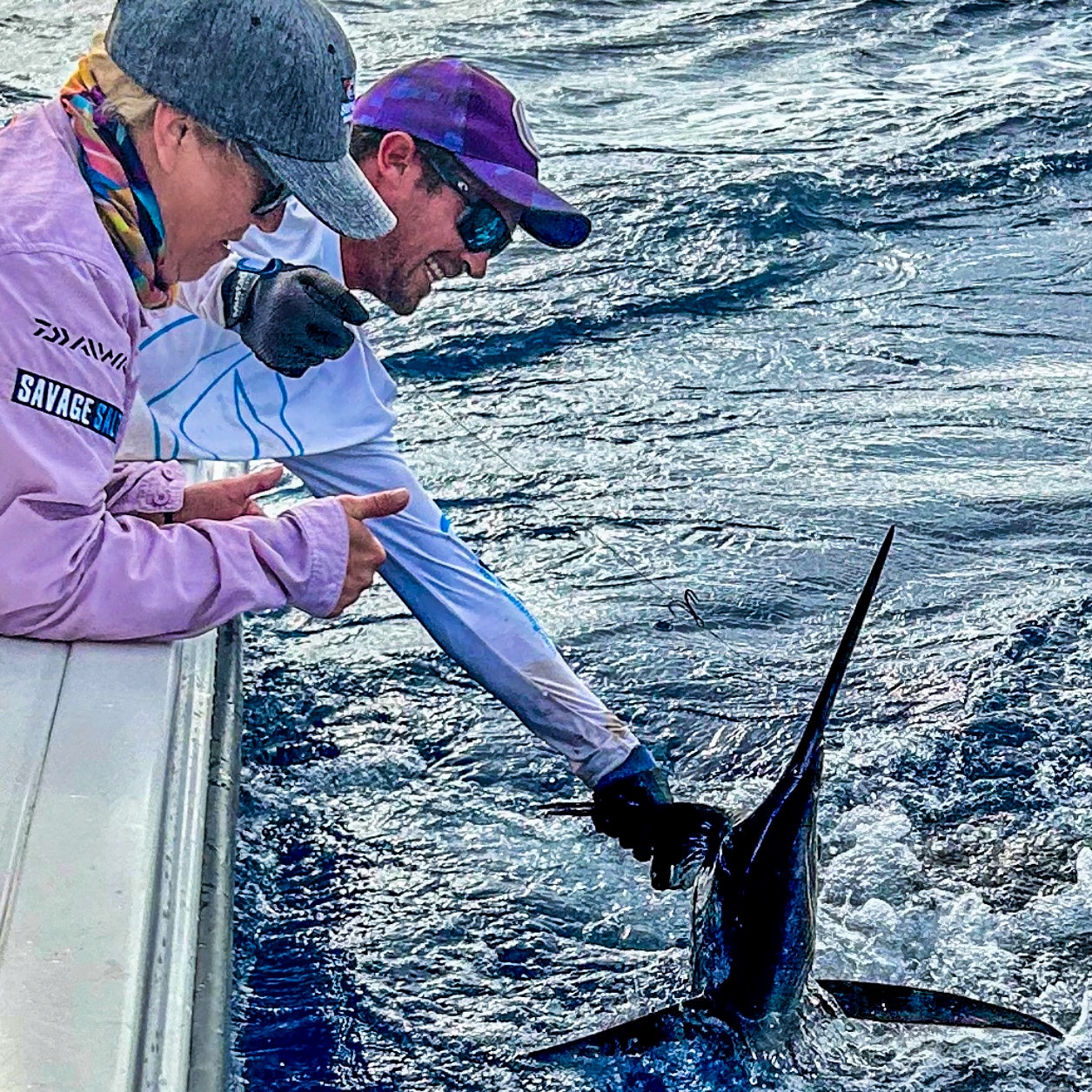 Angler with a sailfish caught in Vanuatu.