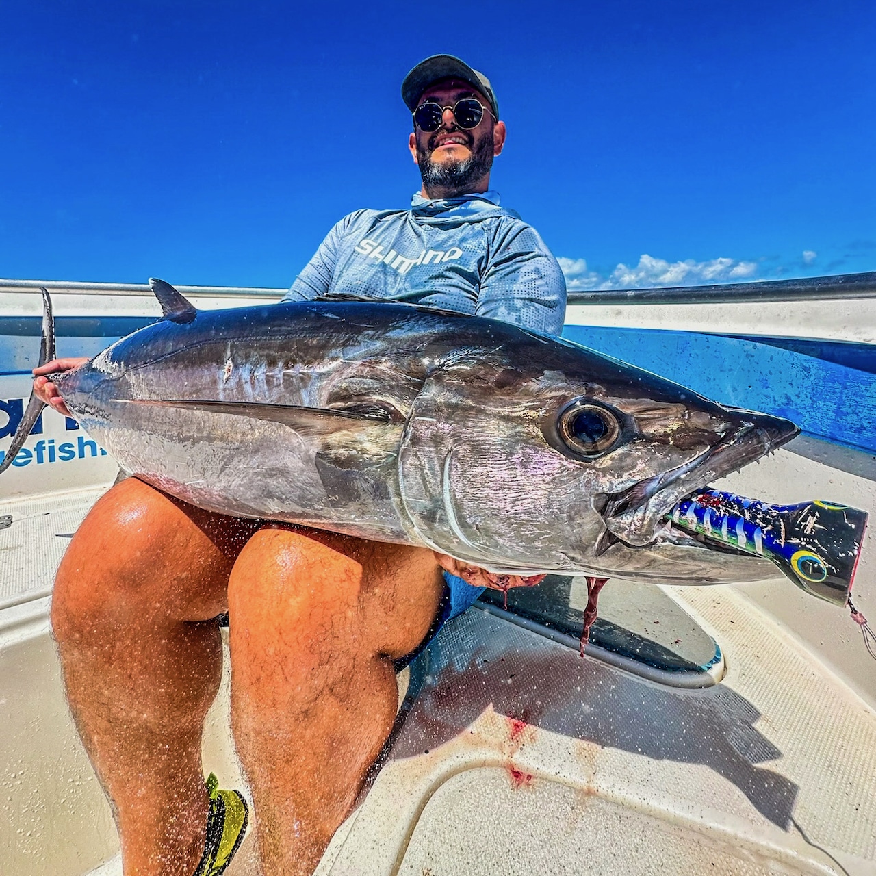 Angler capturing memories of their fishing adventure.